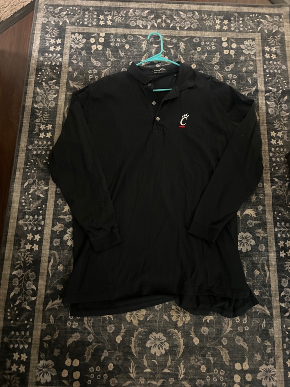 Golf Collection. University of Cincinnati Black Long-Sleeve Polo Golf Shirt